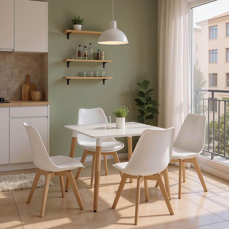 Модерен минималистички трпезариски сет Dining Room Set со квадратна бела маса врз стабилна конструкција и четири ергономски бели Vedaas лоунџ столици во скандинавски стил